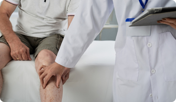 Tampa Bay clinician tests for PVD (peripheral vascular disease) on a dementia patient.