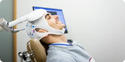 Transcranial Magnetic Stimulation therapy at Revive Clinic for improved memory and brain function.